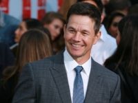 Markwahlbergprays1 Actor Mark Wahlberg attends the Premiere Of STX Films' 'Mile 22' at Westwood Village Theatre on August 9, 2018 in Westwood, California. (Photo by Leon Bennett/Getty Images)