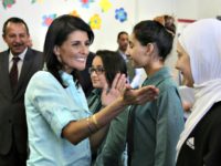 Nikki Haley, Refugees A picture taken on May 21, 2017 shows US Ambassador to the UN Nikki Haley (L) meeting with Syrian refugee students in the Jordanian capital Amman.