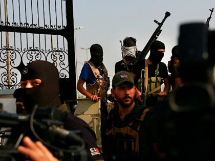 Popular Mobilization Forces parade in Basra, 340 miles (550 km) southeast of Baghdad, Iraq