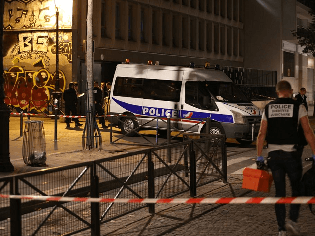 French police is on the scene where a man attacked and injured people with a knife in the streets of Paris in the 19th arrondissement on September 9, 2018. - Seven people including two British tourists were wounded Sunday in Paris after they were attacked by a man armed with …