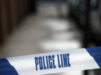 LONDON - FEBRUARY 15: Police tape marks off an area where a man was stabbed and killed in South Norwood on February 15, 2010 in London, United Kingdom. As the UK gears up for one of the most hotly contested general elections in recent history it is expected that that …