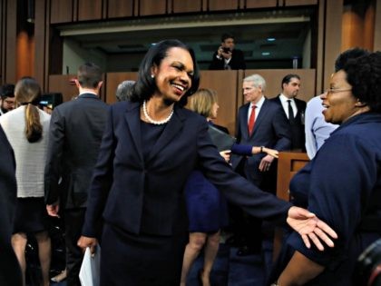 Former Secretary of State Condoleezza Rice, center, arrives to introduce Supreme Court nominee Brett Kavanaugh, Tuesday, Sept. 4, 2018, on Capitol Hill in Washington, at his Senate Judiciary Committee confirmation hearing to replace retired Justice Anthony Kennedy.
