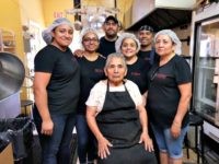 Small Business Members of the family-run business of Mole Poblano Asuncion Corp. pose for a photo in their small store in the Bushwick neighborhood of Brooklyn borough of New York, Tuesday, July 31, 2018. They are, standing from left: Canny Rojas, Sally Rojas, Jesse Hernandez, Christina Mora, Franco Hernandez and Candida Fuentes. …