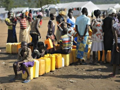 Illustrative: South Sudanese refugees line up to fill their plastic containers with water