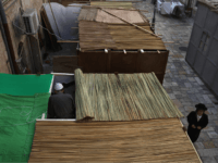 Sukkah An ultra-Orthodox Jew walks between the Sukkahs (tabernacles) that fill a narrow street in the religious Mea Shearim neighbourhood as another Jewish man works on his booth which will be used during the upcoming festival of Sukkot, on October 1, 2009, in Jerusalem, Israel. The eight-day Jewish Feast of the …