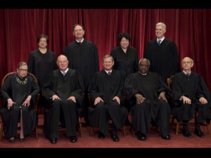 The US Supreme Court justices posing for a photo in Washington, DC, June 1, 2017.
