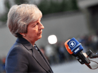 Britain's Prime Minister Theresa May speaks to journalists as she arrives at the Felsenreitschule prior to their informal dinner as part of the EU Informal Summit of Heads of State or Government in Salzburg, Austria on September 19, 2018. (Photo by JOE KLAMAR / AFP) (Photo credit should read JOE …