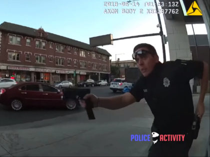 WATCH: Cop Shot During Gunfight Puts Another Magazine in Pistol, Calls His Own Ambulance