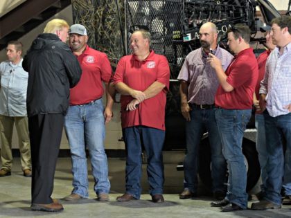 President Donald Trump meets with members of the Cajun Navy at the National Guard Armory in Lake Charles, La., where he also met those dealing with the impact of Hurricane Harvey, Saturday, Sept. 2, 2017.