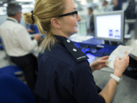 LONDON, ENGLAND - MAY 28: Border Force check the passports of passengers arriving at Gatwick Airport on May 28, 2014 in London, England. Border Force is the law enforcement command within the Home Office responsible for the security of the UK border by enforcing immigration and customs controls on people …