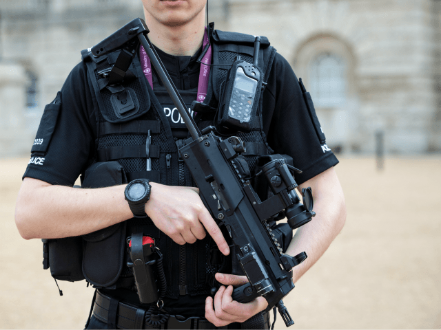 LONDON, ENGLAND - SEPTEMBER 16: An armed police officer patrols in Horse Guards Parade on September 16, 2017 in London, England. An 18-year-old man has been arrested in Dover in connection with yesterday's terror attack on Parsons Green station in which 30 people were injured. The UK terror threat level …