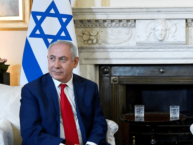 Britain's Prime Minister Theresa May welcomes Israel's Prime Minister Benjamin Netanyahu to Downing Street on June 6, 2018 in London, England. (Photo by Toby Melville - WPA Pool/Getty Images)