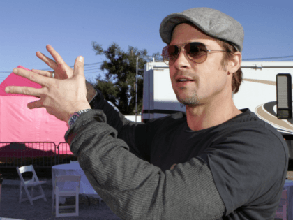 Actor Brad Pitt talks about his plan to build homes in the Lower 9th Ward in New Orleans, Monday, Dec. 3, 2007. Pitt is launching his latest project to build affordable, environmentally friendly homes in the area devastated by Hurricane Katrina. (AP Photo/Bill Haber)