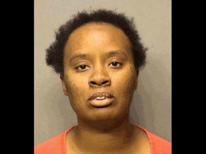 Authorities arrested Joandrea McAtee, 27, Friday and charged her with child neglect for allegedly allowing children as young as 11 years old to get behind the wheel of a school bus as the bus full of kids dropped off students