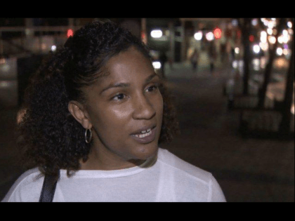 The woman seen on surveillance video chasing after and smacking the man who grabbed her bu