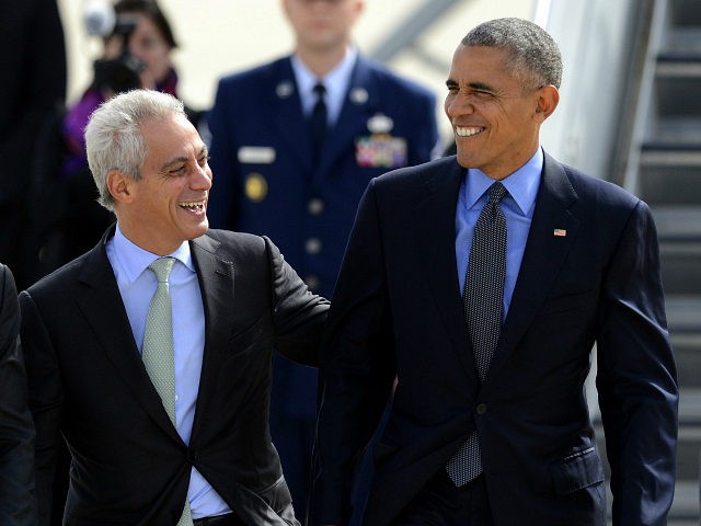 President Barack Obama right, talks with Chicago Mayor Rahm Emanuel left, after walking of