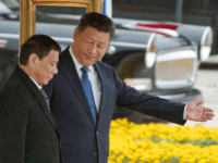 duterte-jinping Chinese President Xi Jinping, right, shows the way to Philippine President Rodrigo Duterte during a welcome ceremony outside the Great Hall of the People in Beijing, China, Thursday, Oct. 20, 2016. (AP Photo/Ng Han Guan)