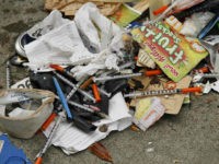 file-san-francisco-tent-city-garbage-needles-drugs-ap File - In this Feb. 26, 2016, file photo, a number of syringes are scattered in the remains of a tent city being cleared by city workers along Division Street in San Francisco. The mayor of San Francisco says he is hiring 10 workers whose sole responsibility will be to …