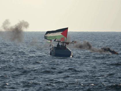 Palestinian protestors in boats take part in a demonstration near the maritime border with