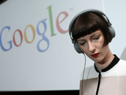 A DJ plays music on September 26, 2012 at the official opening party of the Google offices