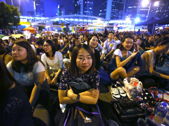Pro-democracy activists protest outside government headquarters in downtown Hong Kong in 2