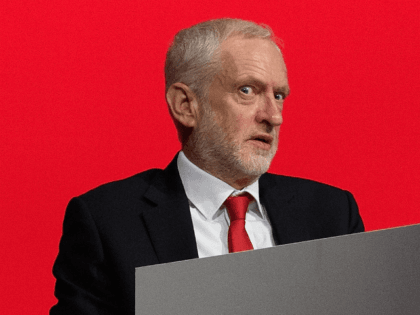 Labour Party leader Jeremy Corbyn reacts as a delegate passionately argues against rushing through a proposed change to the selection of local MPs at the ACC Liverpool during the first day of the annual Labour Party conference on September 23, 2018 in Liverpool, England. Labour's official slogan for the conference …