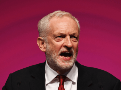 Labour Party leader, Jeremy Corbyn addresses delegates on day four of the Labour Party conference at the Arena and Convention Centre on September 26, 2018 in Liverpool, England. In his closing speech to the conference the Labour leader will promise to 'kickstart a green jobs revolution' and expand the provision …