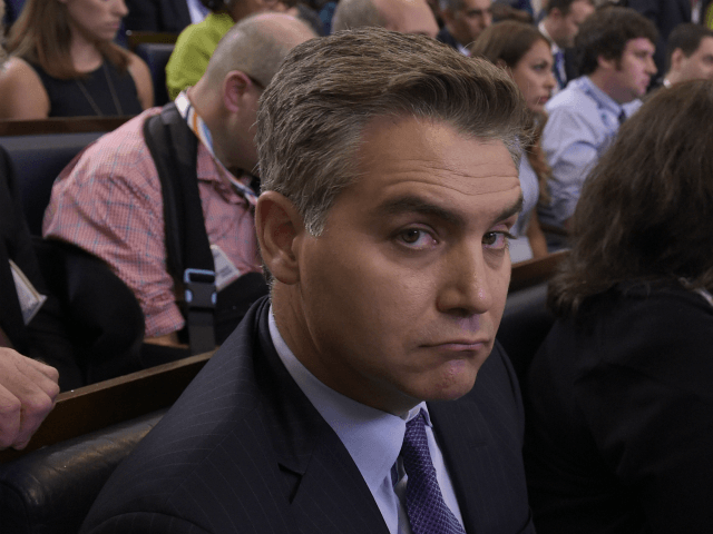 Jim Acosta of CNN listens during the daily briefing at the White House in Washington, Wedn