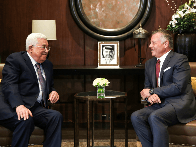 Jordan's King Abdullah II (R) meets with Palestinian president Mahmoud Abbas at the Royal