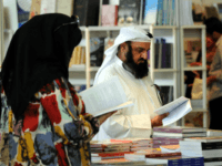 kuwait books Visitors look at exhibits during the 35th Kuwait International Book Fair on Thursday, October 14, 2010 in Mishref Fair Grounds, Kuwait. This year's edition of the fair is surrounded by controversy over the amount of censorship applied by the government on publishers. (AP Photo/Gustavo Ferrari)