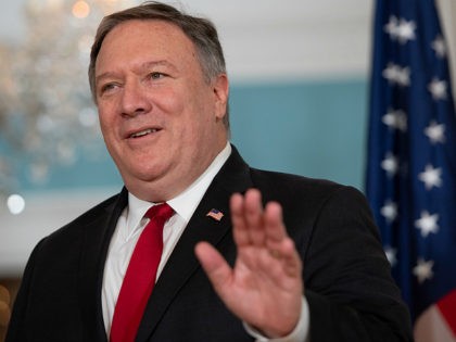 US Secretary of State Mike Pompeo waves to the media during a photo opportunity prior to his meetings with Macedonian Minister of Foreign Affairs Nikola Dimitrov at the State Department in Washington, DC, August 21, 2018. (Photo by SAUL LOEB / AFP) (Photo credit should read SAUL LOEB/AFP/Getty Images)