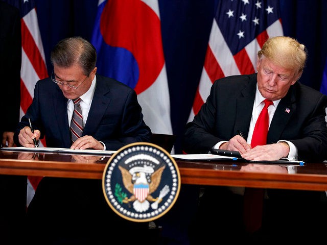 President Donald Trump and South Korean President Moon Jae-In participate in a signing cer