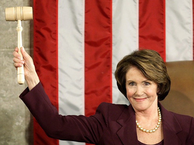 WASHINGTON - JANUARY 04: Speaker of the House Nancy Pelosi (D-CA) holds up the Speaker's gavel after being elected as the first woman Speaker during a swearing in ceremony for the 110th Congress in the House Chamber of the U.S. Capitol January 4, 2007 in Washington, DC. Pelosi will lead …