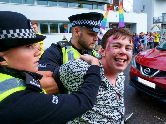 GLASGOW, SCOTLAND - AUGUST 19: Police arrest people protesting that the police were allowe
