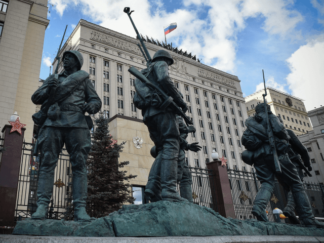 Statues of soldiers are displayed in front of the Russian Defence Ministry headquarters on