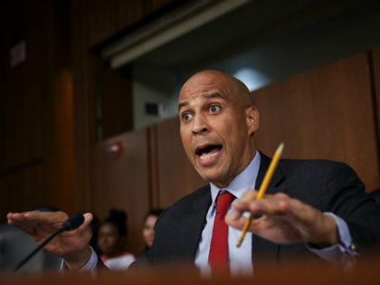 WASHINGTON, DC - SEPTEMBER 6: Sen. Cory Booker (D-NJ) questions Supreme Court nominee Judge Brett Kavanaugh before the Senate Judiciary Committee on the third day of his Supreme Court confirmation hearing on Capitol Hill September 6, 2018 in Washington, DC. Kavanaugh was nominated by President Donald Trump to fill the …