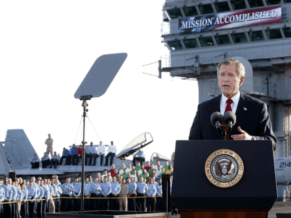 US President George W. Bush addresses the nation aboard the nuclear aircraft carrier USS Abraham Lincoln 01 May, 2003, as it sails for Naval Air Station North Island, San Diego, California. Bush declared major fighting over in Iraq, calling it 'one victory in a war on terror' which he said …