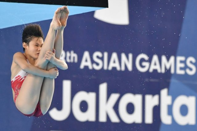 Early starts and green veg: how China became diving greats