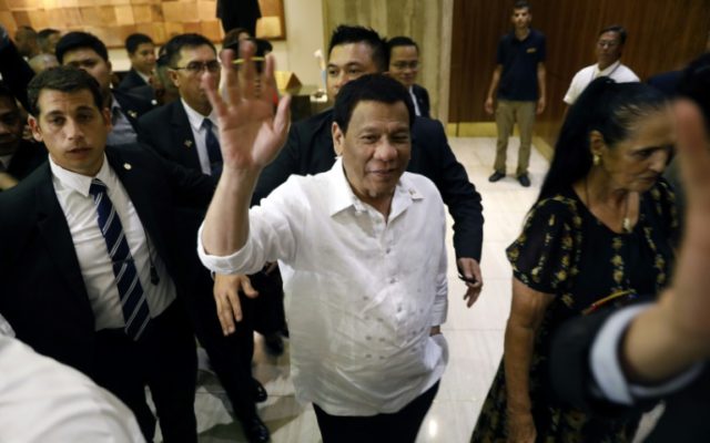 Philippine leader who compared self to Hitler visits Israeli Holocaust memorial