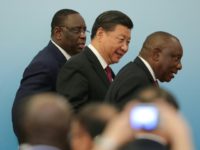 Chinese President Xi Jinping (C) with South African President Cyril Ramaphosa (R) and Senegalese President Macky Sall (L) attend a joint press conference Chinese President Xi Jinping (C) with South African President Cyril Ramaphosa (R) and Senegalese President Macky Sall (L) attend a joint press conference