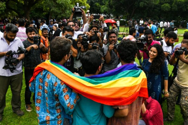 India celebrates gay sex ruling with dance, chocolate and tears