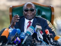 Zimbabwe's Mugabe accepts disputed election result