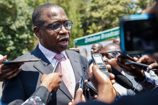 Zimbabwe seeks return to dollar as new govt sworn in