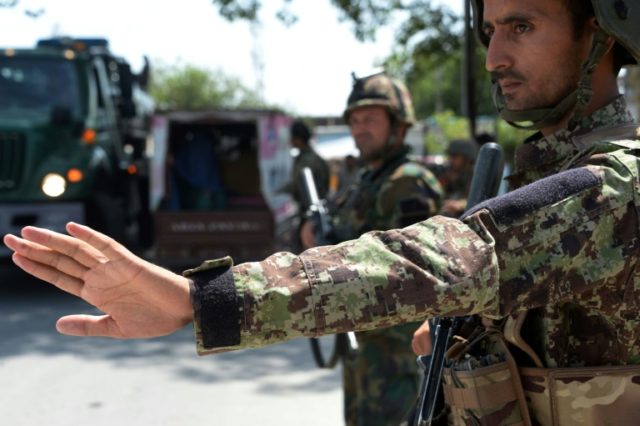 At least 32 killed in suicide attack on Afghan protesters