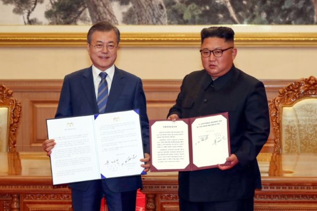 N. Korea's Kim says to visit Seoul, shut missile site