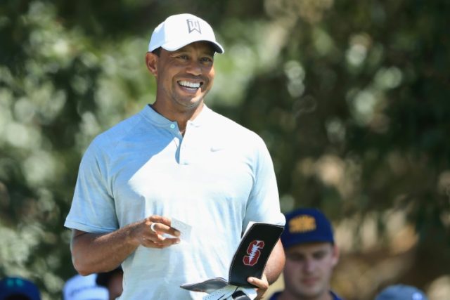 Woods maintains share of the lead at Tour Championship