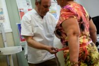 Carlos Pineiro (L), a 63-year-old family doctor, is behind a programme for residents in the small Spanish town of Naron to lose 100,000 kilos (220,500 pounds) by early 2020