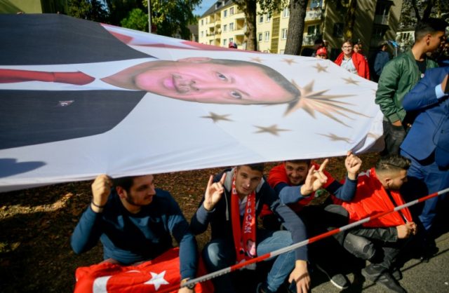 Rival rallies as Erdogan opens mega mosque in Cologne