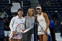 Baby talk: Martina Hingis poses with Madison Keys and Carla Suarez Navarro at the US Open quarter-finals