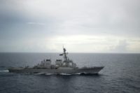 This US Navy photo shows the Guided-missile destroyer USS Decatur (DDG 73) as it operates in the South China Sea